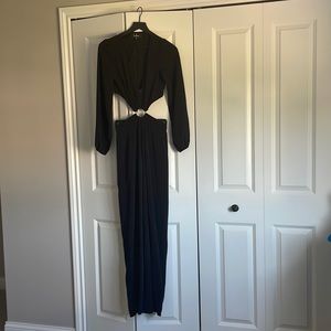 Black long sleeve jumpsuit with cutout sides